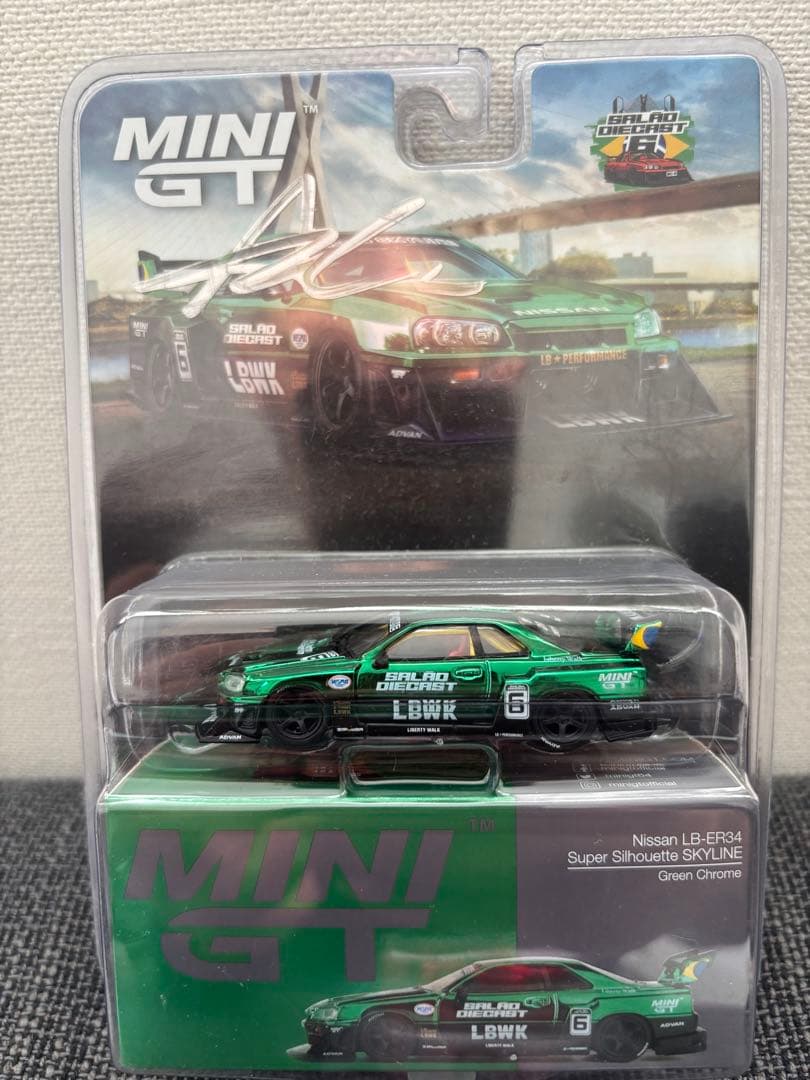 MINI GT R34 ミニカー ブラジルコンベンションーサイン入り Amazon | MINI GT 1/64 ニッサン スカイライン GT-R R34 Top Secret